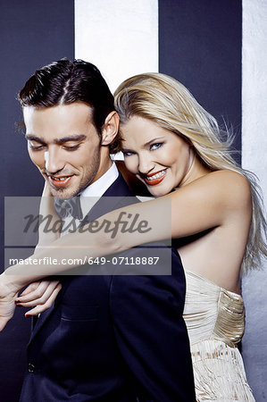 Young couple dancing closely in nightclub