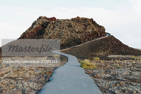 A Paved Pathway Up Into The Lava Fields Of The Craters Of The Moon National Monument And Preserve In Butte County Idaho.
