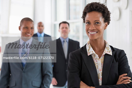 Business People. A Team Of People, A Department Or Company. Three Men And One Woman.