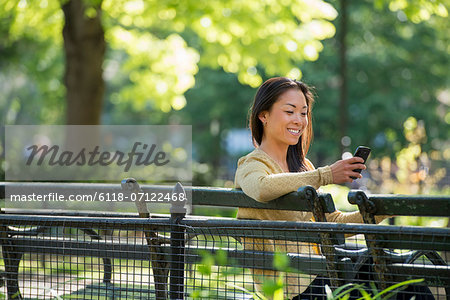 A Businesswoman And Two Businessmen Outdoors In The City.