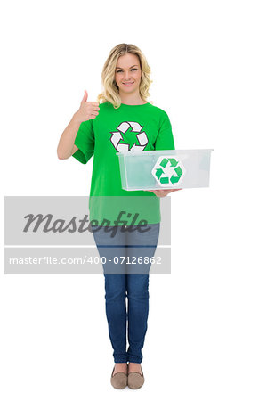 Smiling cute environmental activist holding recycling box thumb up on white background