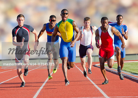 Six athletes running on race track