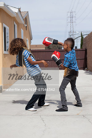 Two brothers boxing