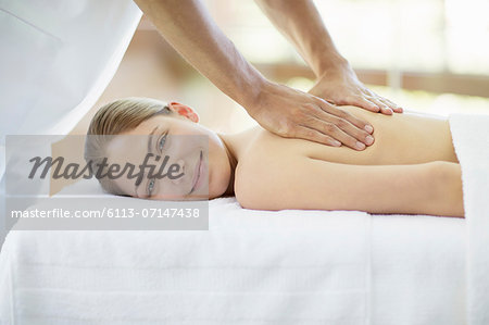 Woman having massage in spa