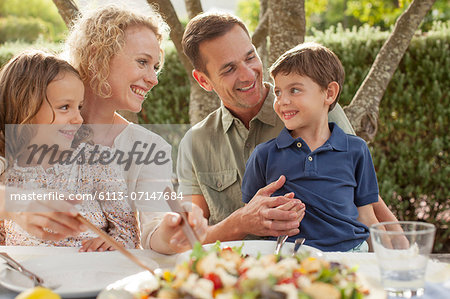 Family eating outdoors