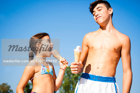 Boy and Girl eating Ice Cream Cones, Lampertheim, Hesse, Germany