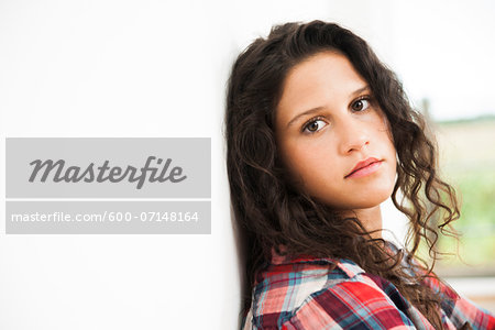 Portrait of teenage girl, looking at camera, Germany