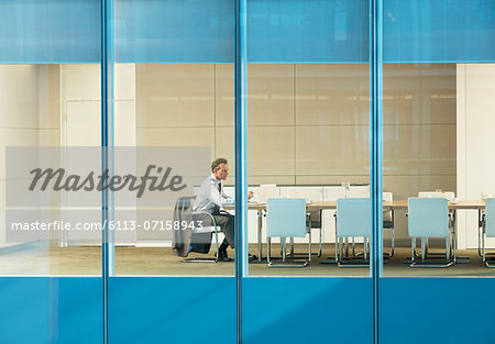 Businessman sitting in conference room