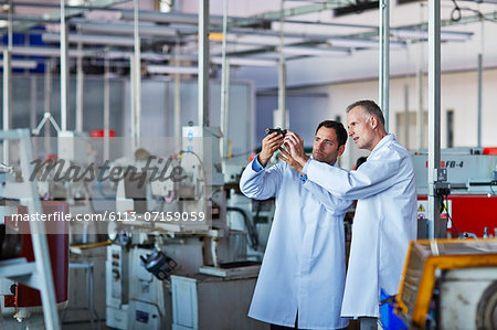 Scientists working in laboratory Scientists working in laboratory
