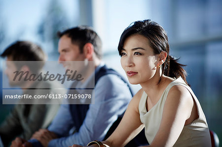 Business people sitting in meeting