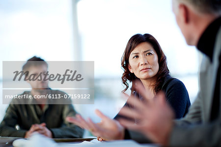 Business people talking in meeting