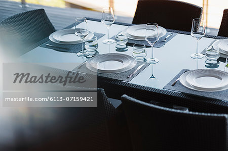 Set table in modern dining room