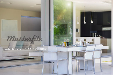 Dining table on modern patio Dining table on modern patio