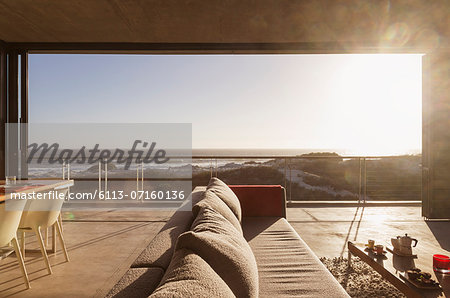 Modern living room overlooking ocean Modern living room overlooking ocean