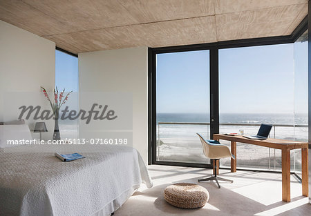 Modern bedroom overlooking ocean