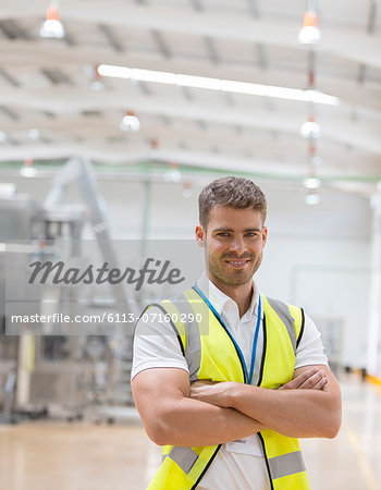 Worker smiling in factory