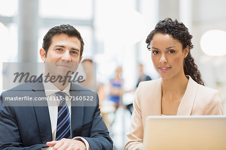 Business people smiling in office