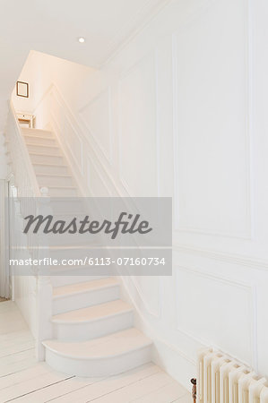 White staircase in modern house