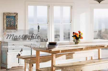 Wooden table in dining room Wooden table in dining room