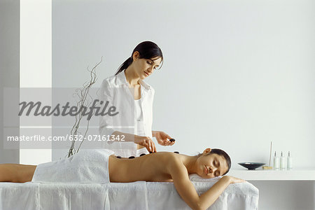 Woman receiving lastone therapy