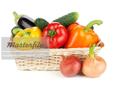 Fresh ripe vegetables in basket. Isolated on white background