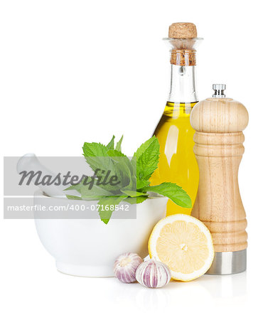 Condiments and herbs. Isolated on white background