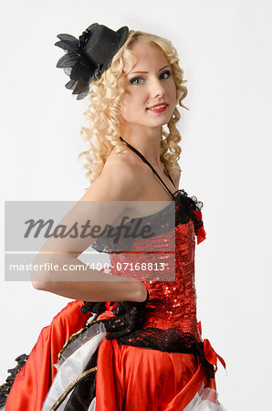 Young sexy blonde dancing in studio a french cancan