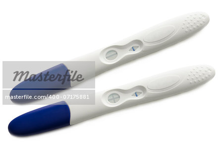 Two pregnancy tests- positive and negative. Isolated on a white background.