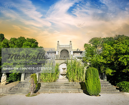 Stairs and palace in beautiful green garden