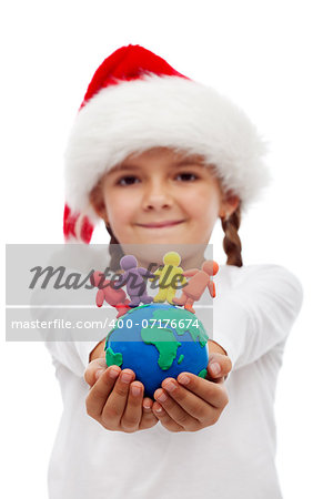 One world of happy people at christmas concept - little girtl holding earth and people made of clay, isolated