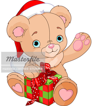 Christmas Teddy Bear holding gift box