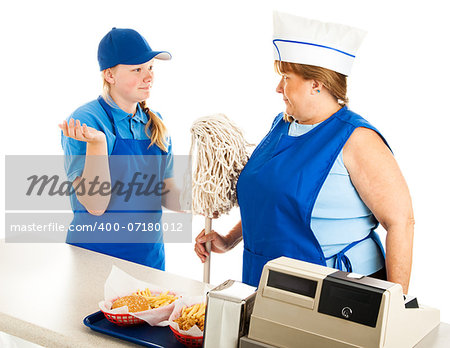 Adult woman working at a fast food job has to take orders from a teenage boss.  Isolated on white.