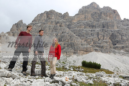Group of young people in the mountains Alps Italy