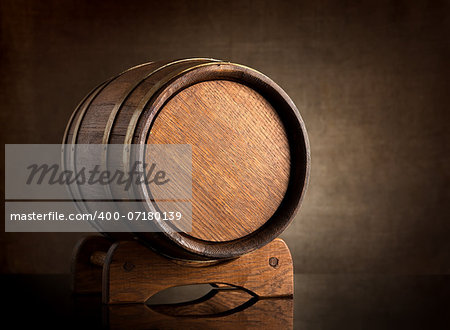 Old wooden barrel on a background of canvas
