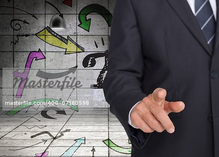 Composite image of businessman in suit pointing finger standing in grey room with illustrations