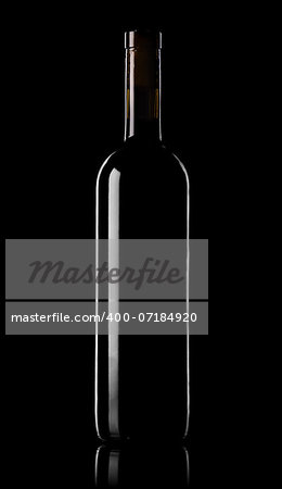 Bottle of red wine on a black background