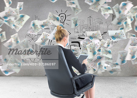 Composite image of blonde businesswoman sitting on swivel chair with tablet