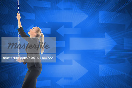 Composite image of blonde businesswoman pulling a chain