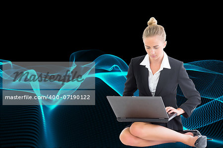 Composite image of blonde businesswoman using laptop