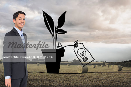 Composite image of smiling asian businessman