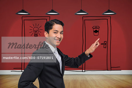 Composite image of smiling asian businessman pointing