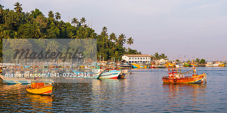 Old commercial fishing boats in Mirissa Harbour, South Coast of Sri Lanka, Asia Old commercial fishing boats in Mirissa Harbour, South Coast of Sri Lanka, Asia