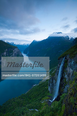 The dramatic Geiranger Fjord illuminated at dusk, UNESCO World Heritage Site, More og Romsdal, Norway, Scandinavia, Europe