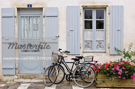 Traditional home with bicycles, Ile De Re, France.