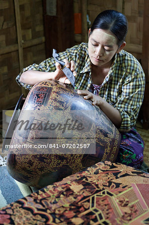 Engraving traditional lacquerware, Bagan, Central Myanmar, Myanmar (Burma), Asia