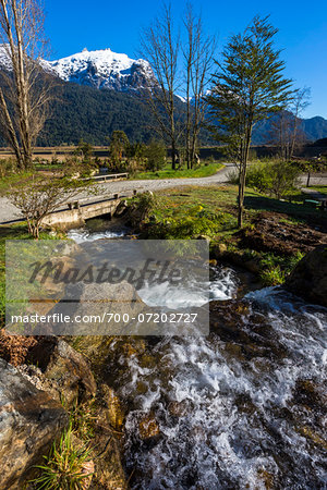 Scenic view of mountains and stream, Peulla, Parque Nacional Vicente Perez Rosales, Patagonia, Chile