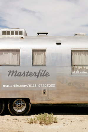 A vintage Airstream silver accommodation trailer parked on the Bonneville Salt Flats during Speed week.