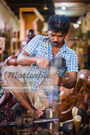 Carpenter working at the Ancient City of Polonnaruwa, Cultural Triangle, Sri Lanka, Asia