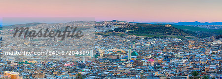 Elevated view across the Old Medina of Fes illuminated at dusk, UNESCO World Heritage Site, Fes, Morocco, North Africa, Africa