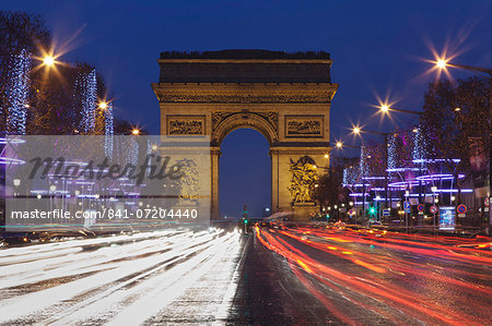 Champs Elysees and Arc de Triomphe at Christmas, Paris, Ile de France, France, Europe Champs Elysees and Arc de Triomphe at Christmas, Paris, Ile de France, France, Europe